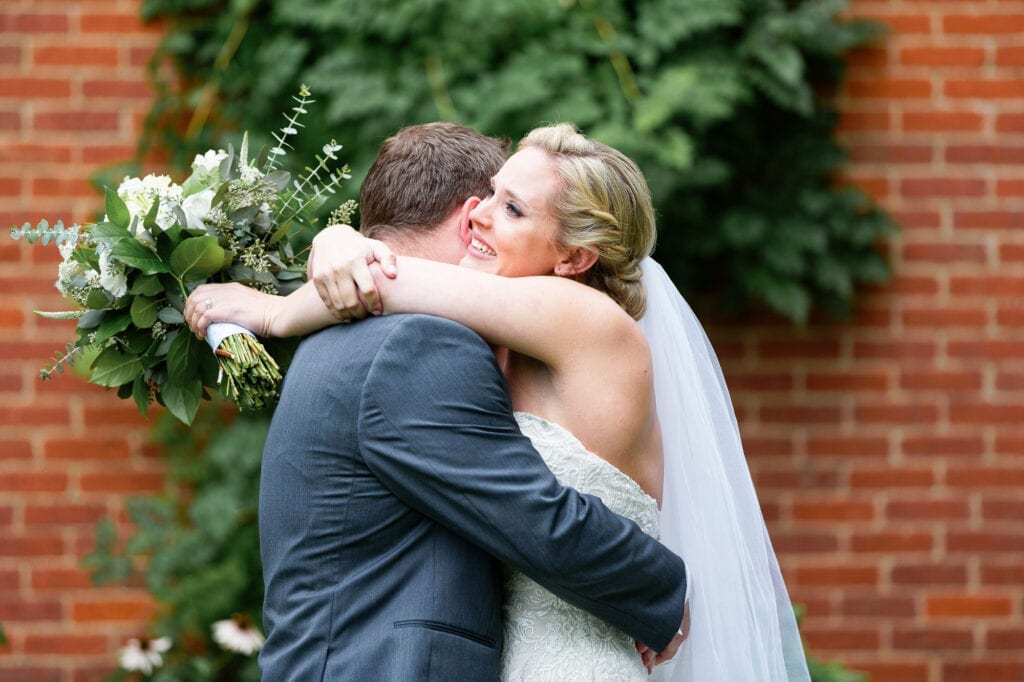 bride and groom first look emotion