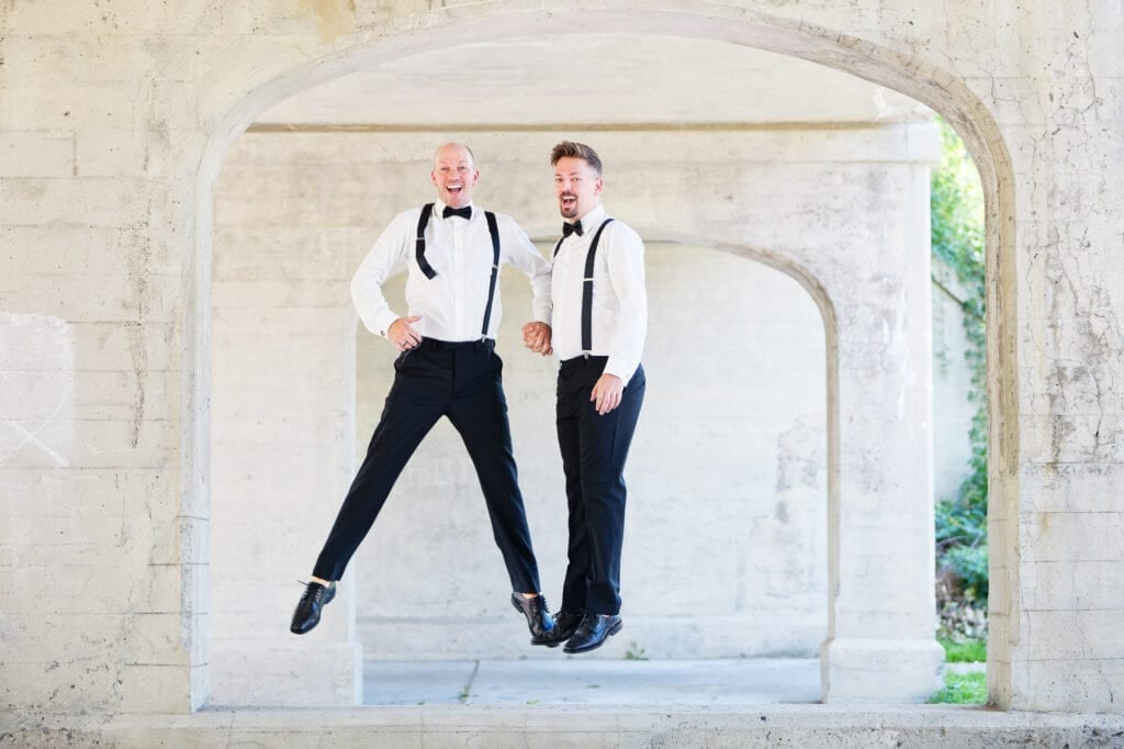 groom and groom jumping