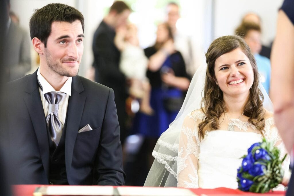 reaction of the bride and the groom to the mayors speech