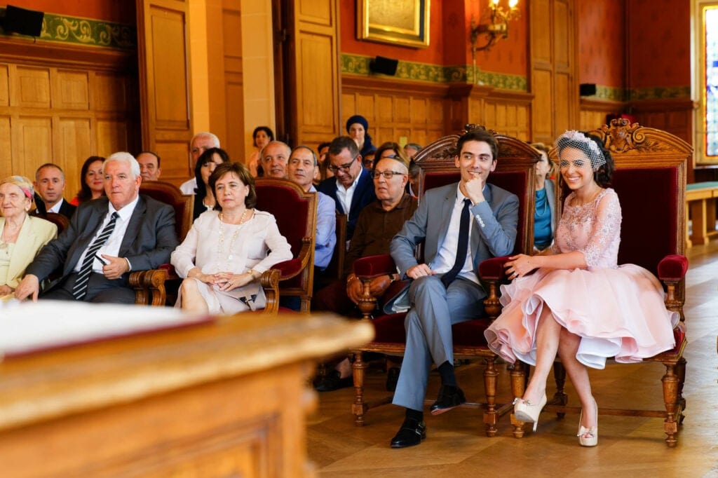 bride and groom monitoring the mayor