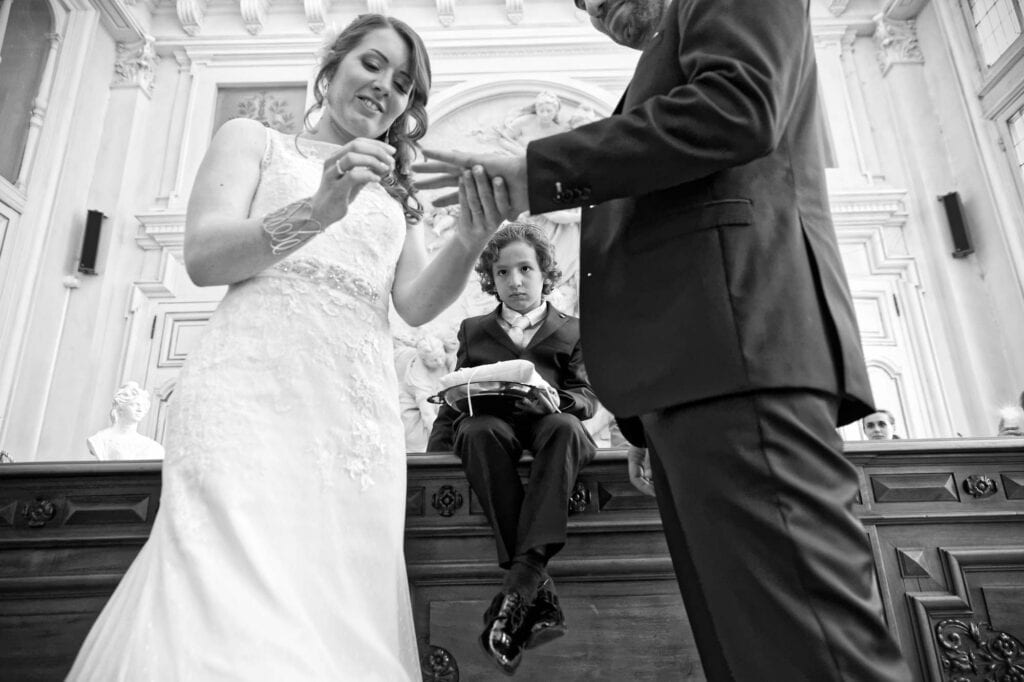 ring bearer seated on the mayors desk