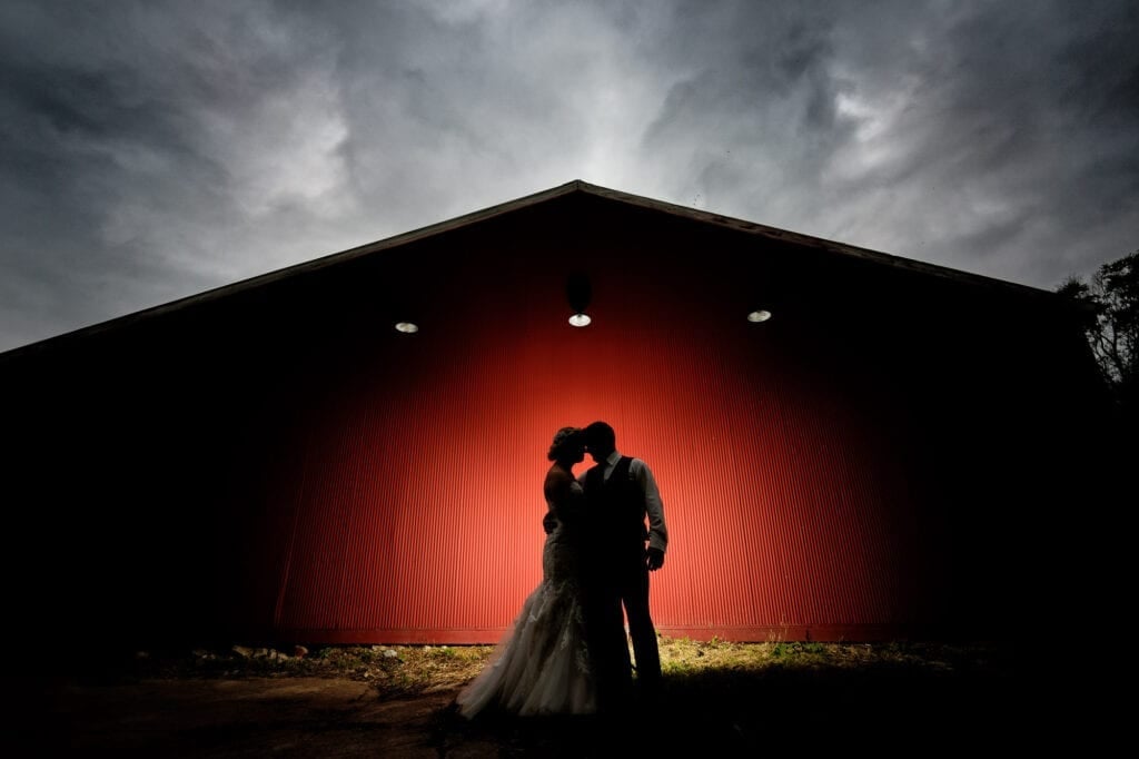 bride and groom creative silhouette picture with red background