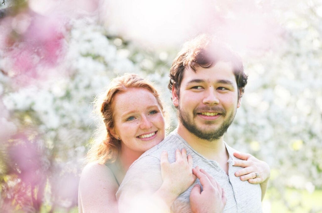 spring photo session couple in flowers