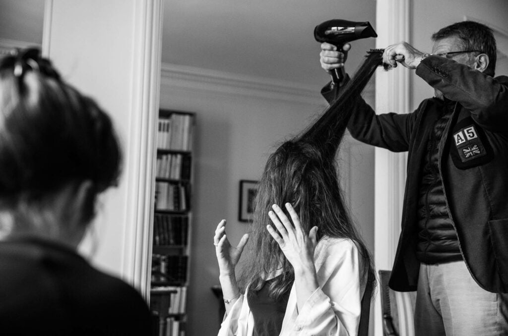 hair stylist giving bad times to brides