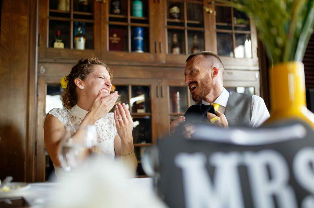 bride and groom happy moment sharing food