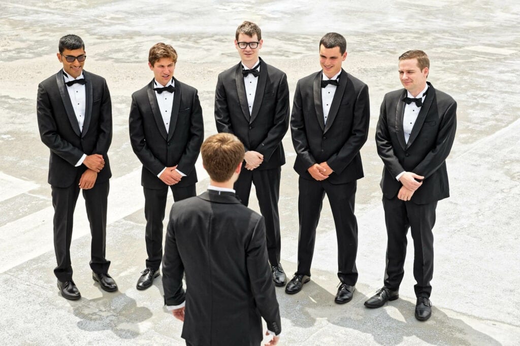 groomsmen reviewing