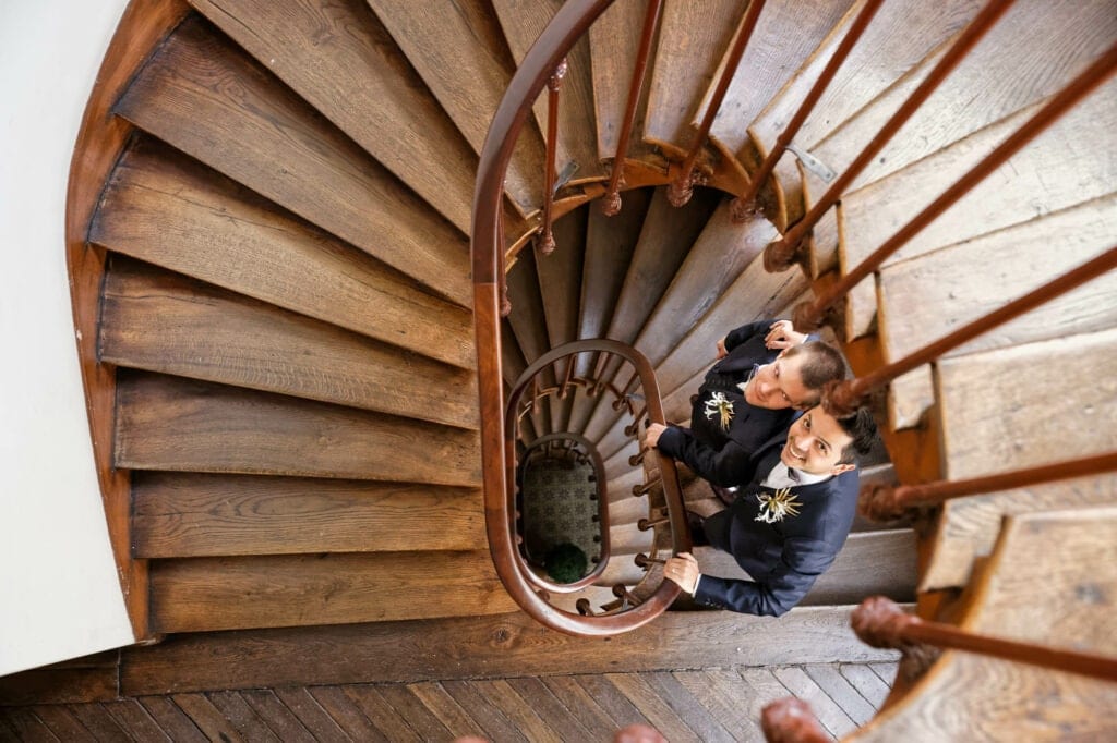 same sex wedding couple in stairs