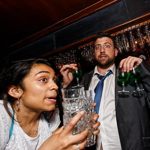 Wedding Guests Surprised at Bar Reception Moment