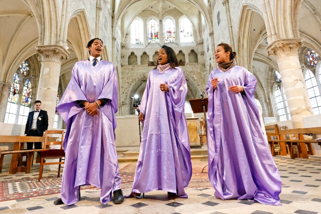 gospel music in purple outfit