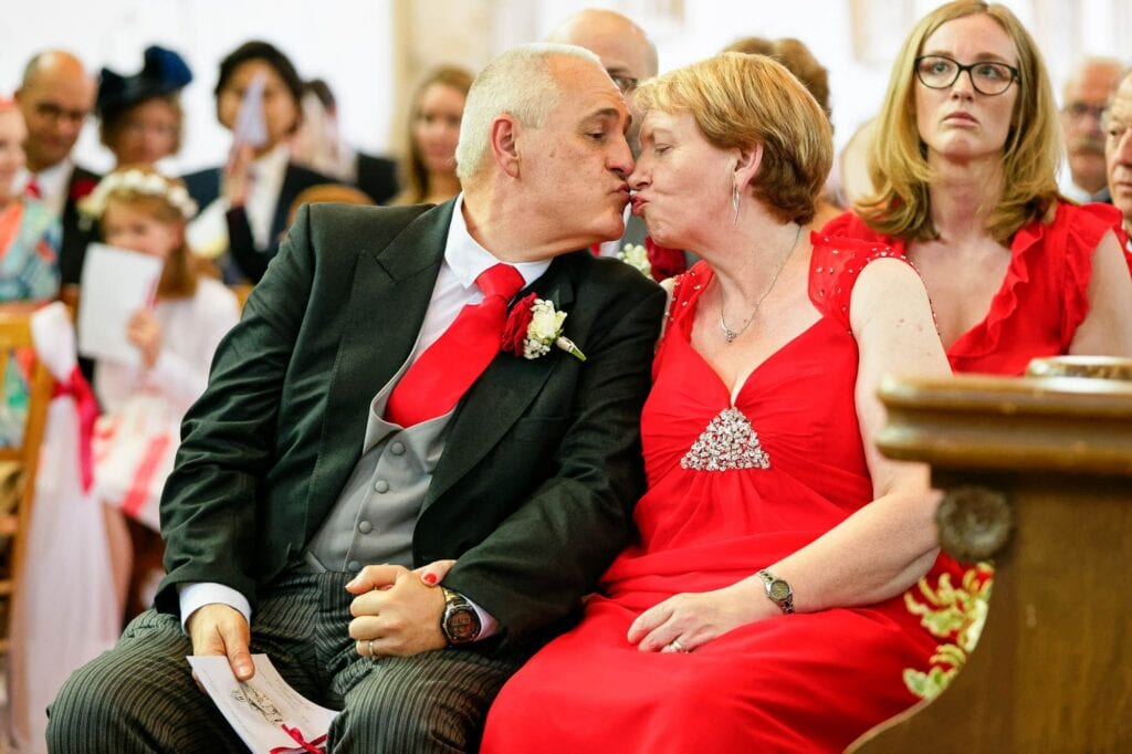 parents kissing during sermons thirthy years of marriage and still in love