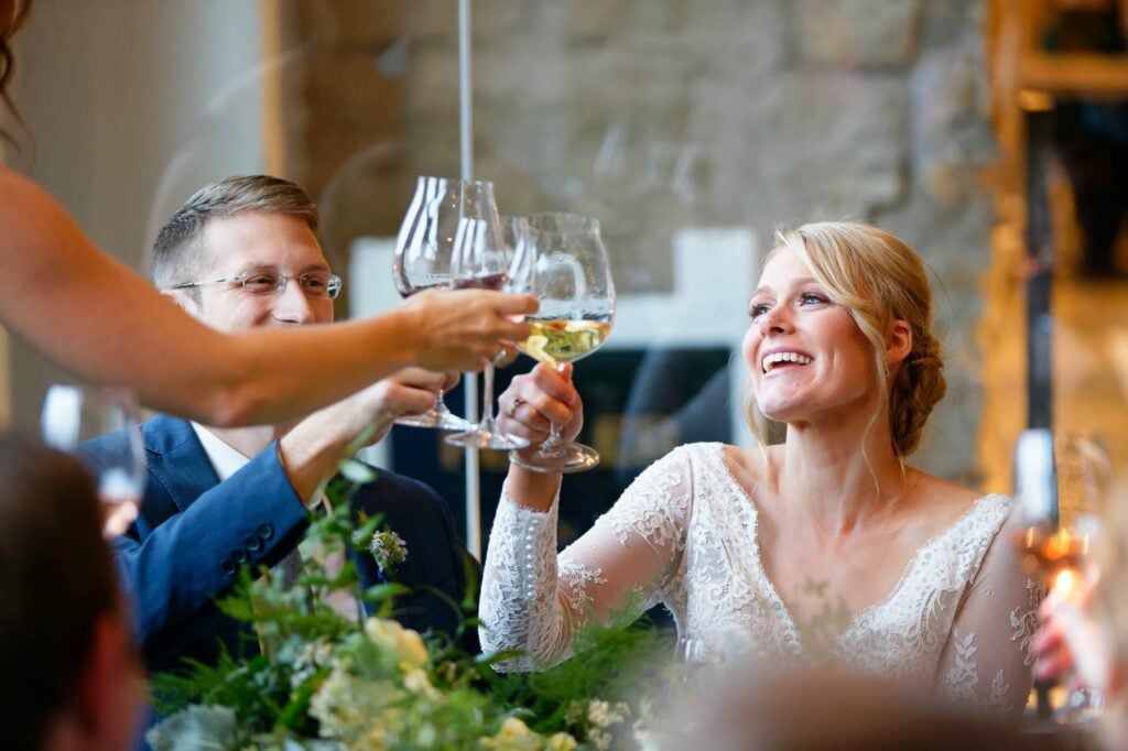 couple cheering with wine