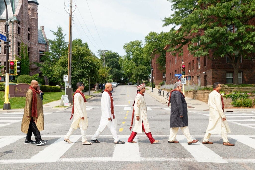 groom and groomsmen mucking the famous beatless cover