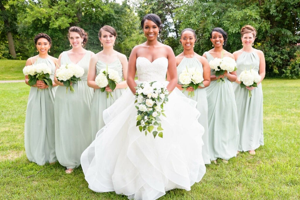 beautifull bride and bridesmaid in park