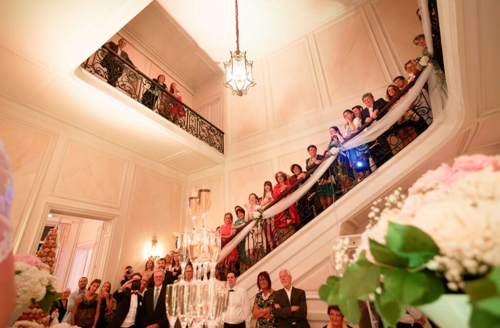 guests in the stairs for the champagne pyramid