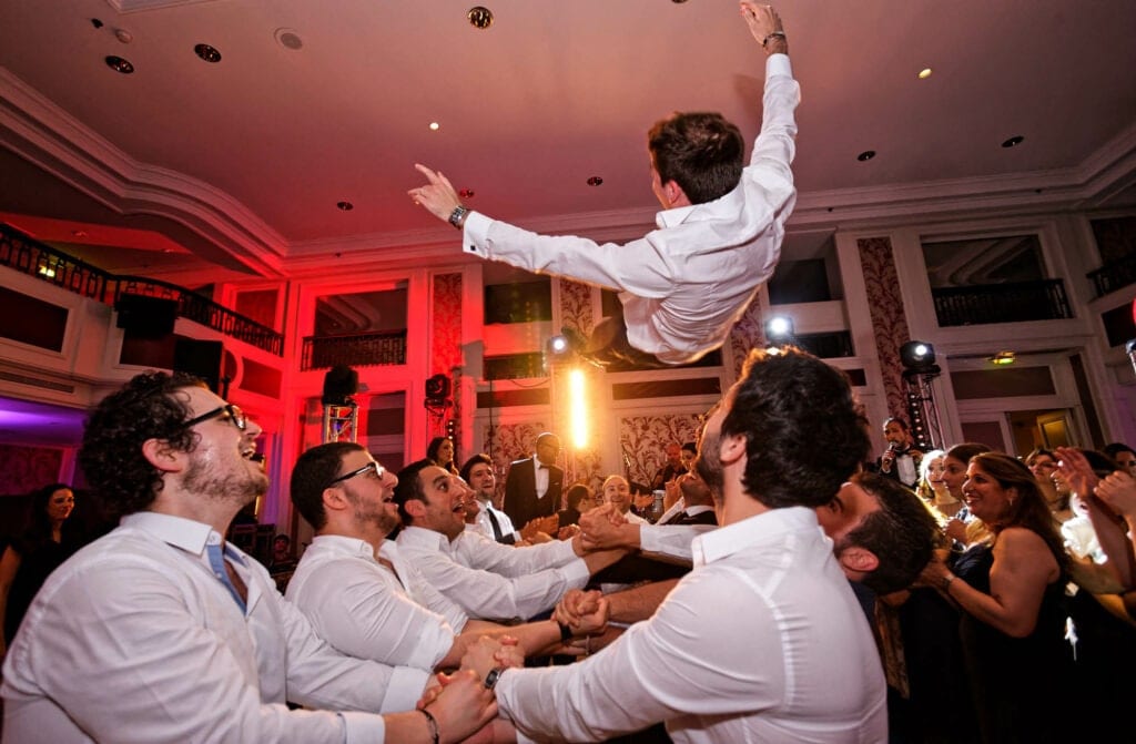 throwing the groom into the air