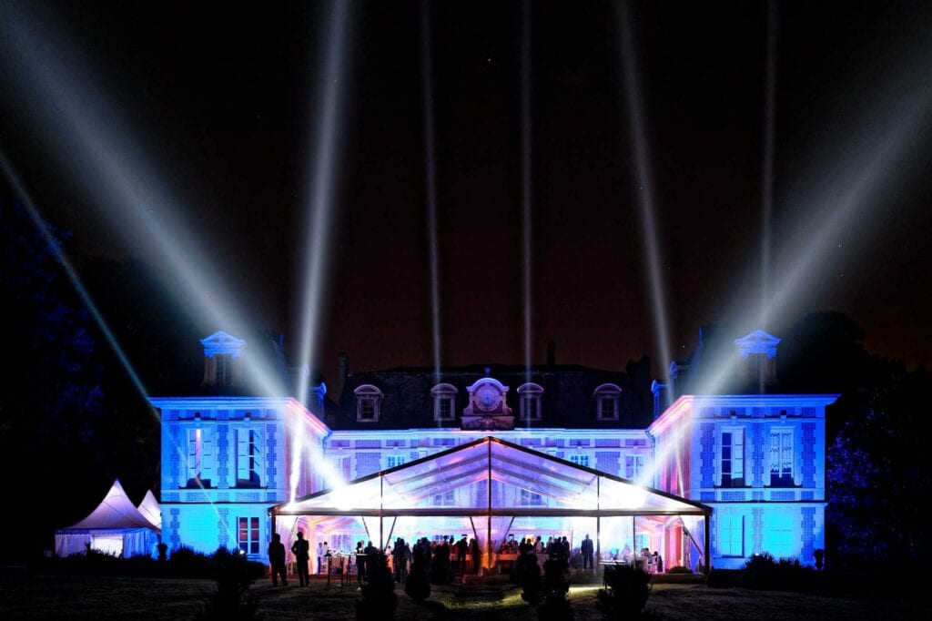 castle lightened with laser by night