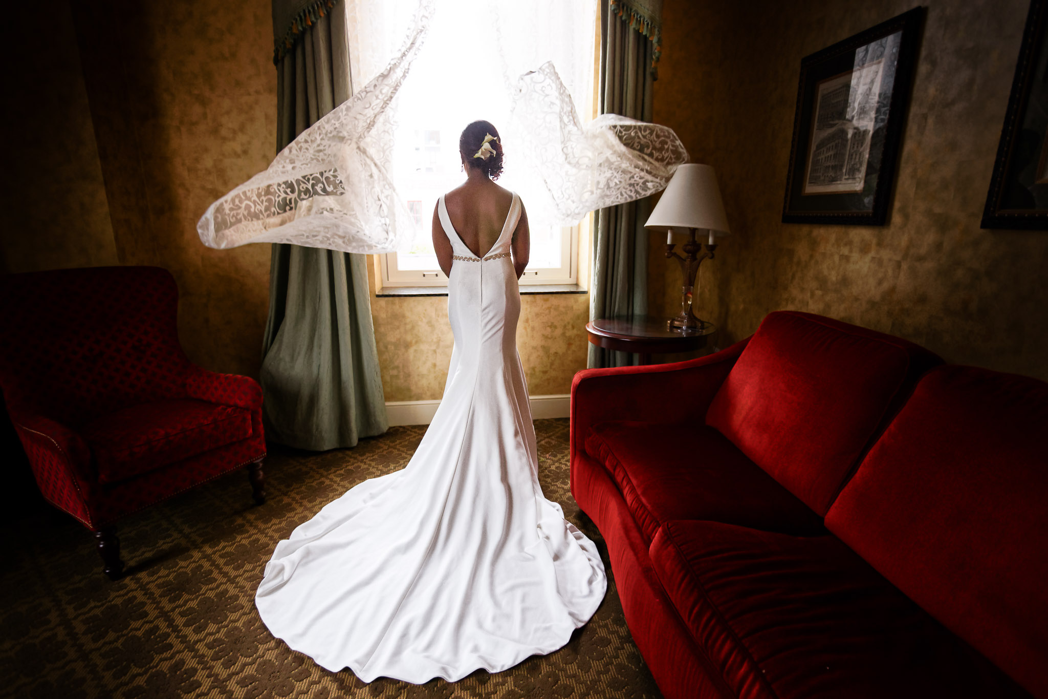 Bride Wedding Dress Flying in Air During Getting Ready Photos