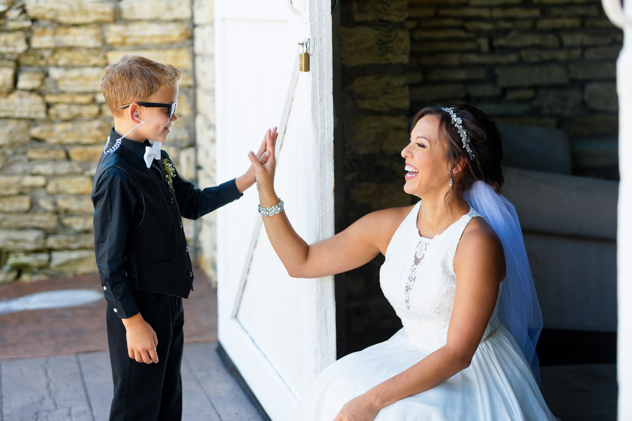 Bride High Five with Ring Bearer Wedding Portrait