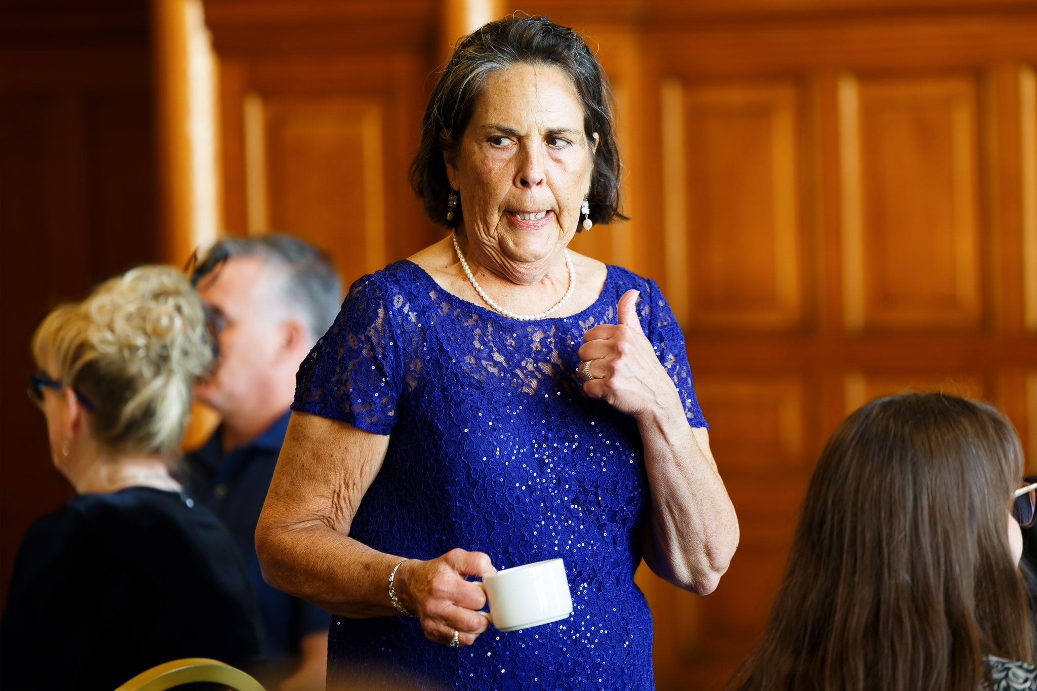 Wedding Guest Thumbs Up at Landmark Center St Paul Ceremony