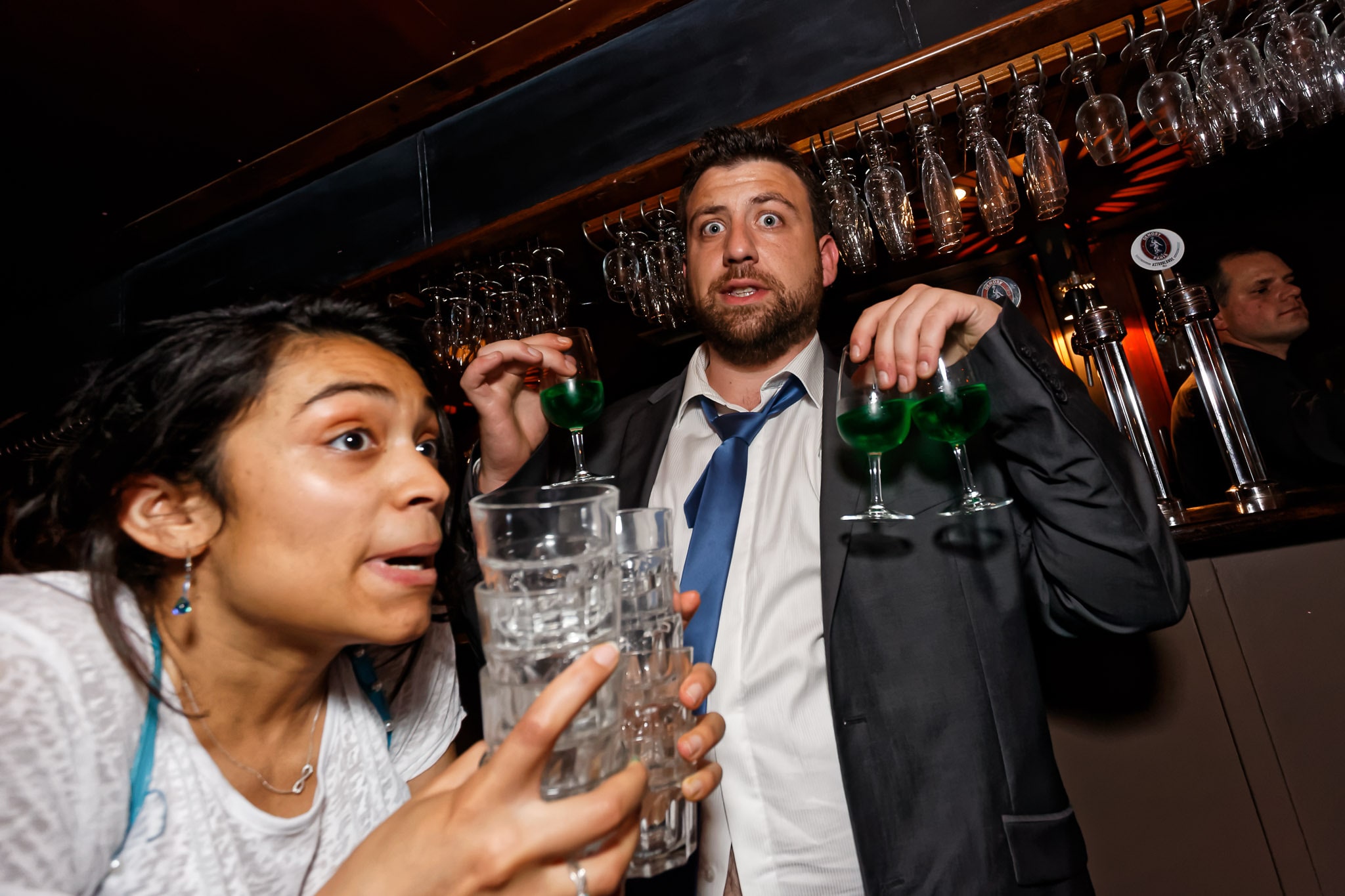 Wedding Guests Surprised at Bar Reception Moment