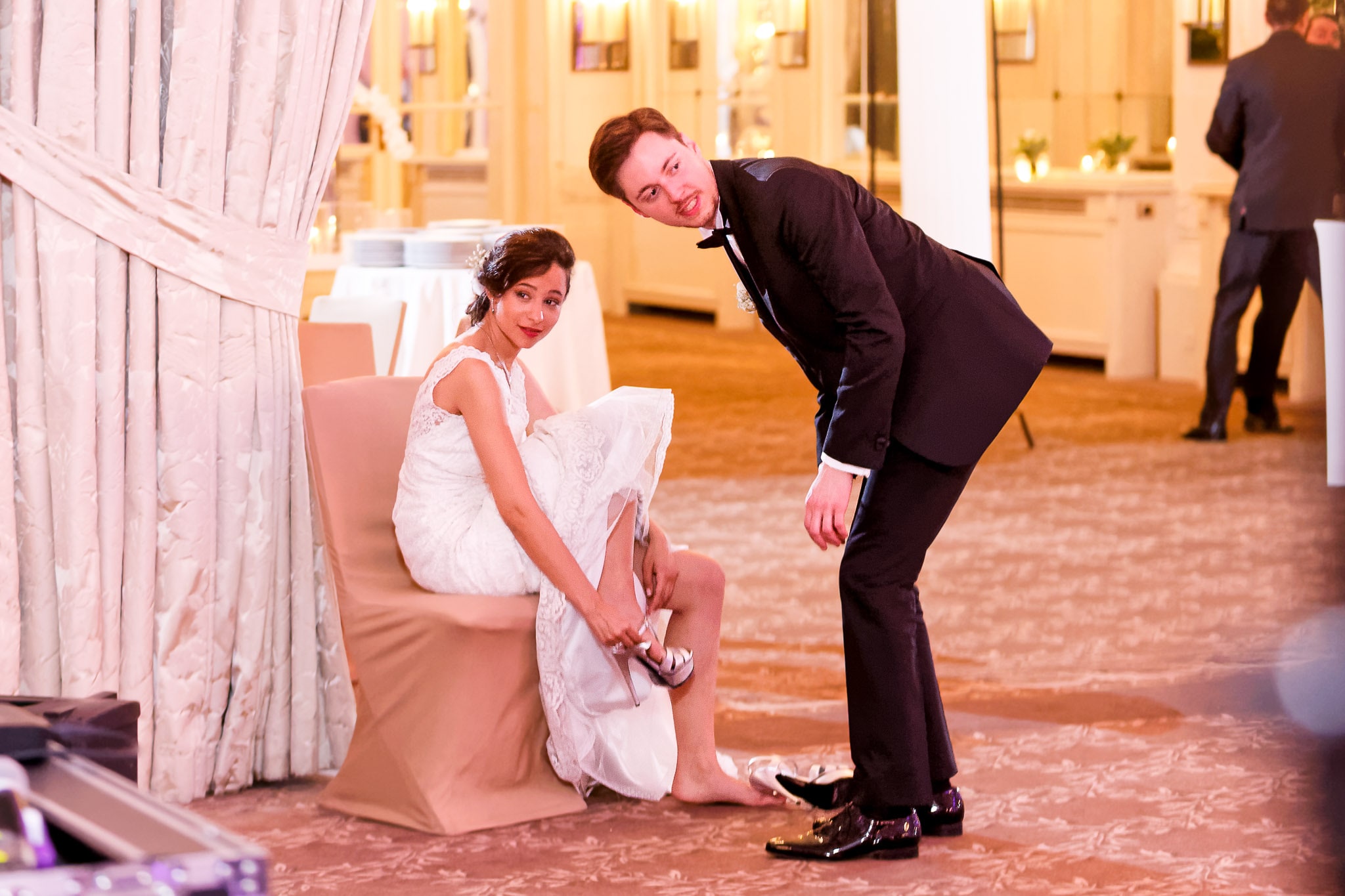 Bride Changing Shoes Before First Dance Wedding Reception