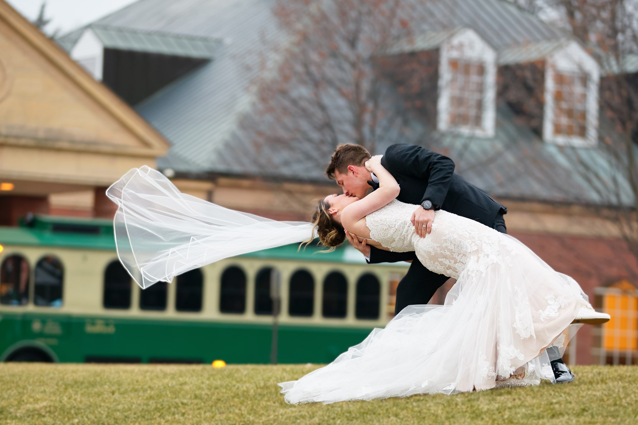 Windy Wedding Kiss Outside Minnesota Church