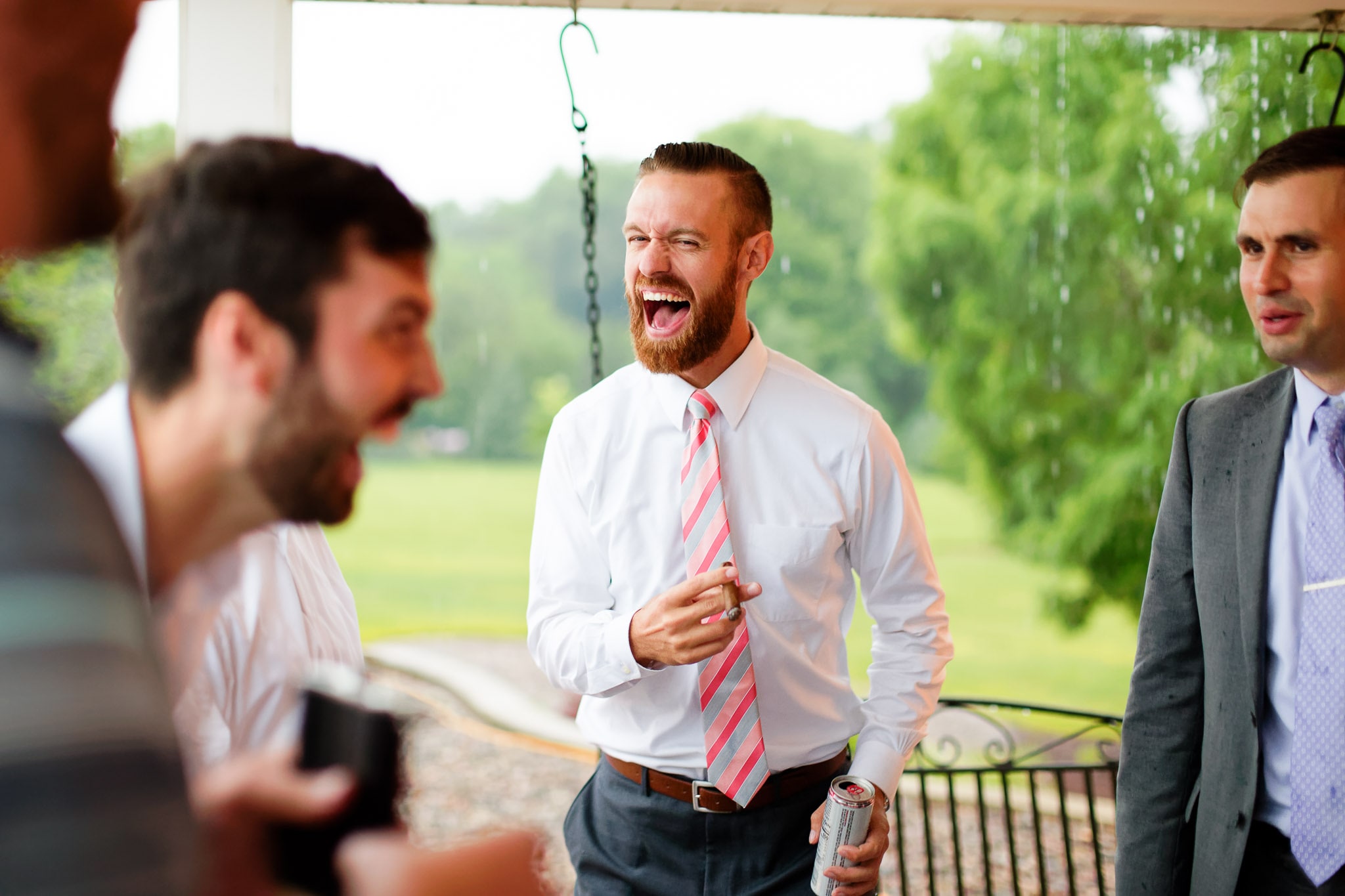 Groomsmen Smoking Cigars Wedding Cocktail Hour Reception