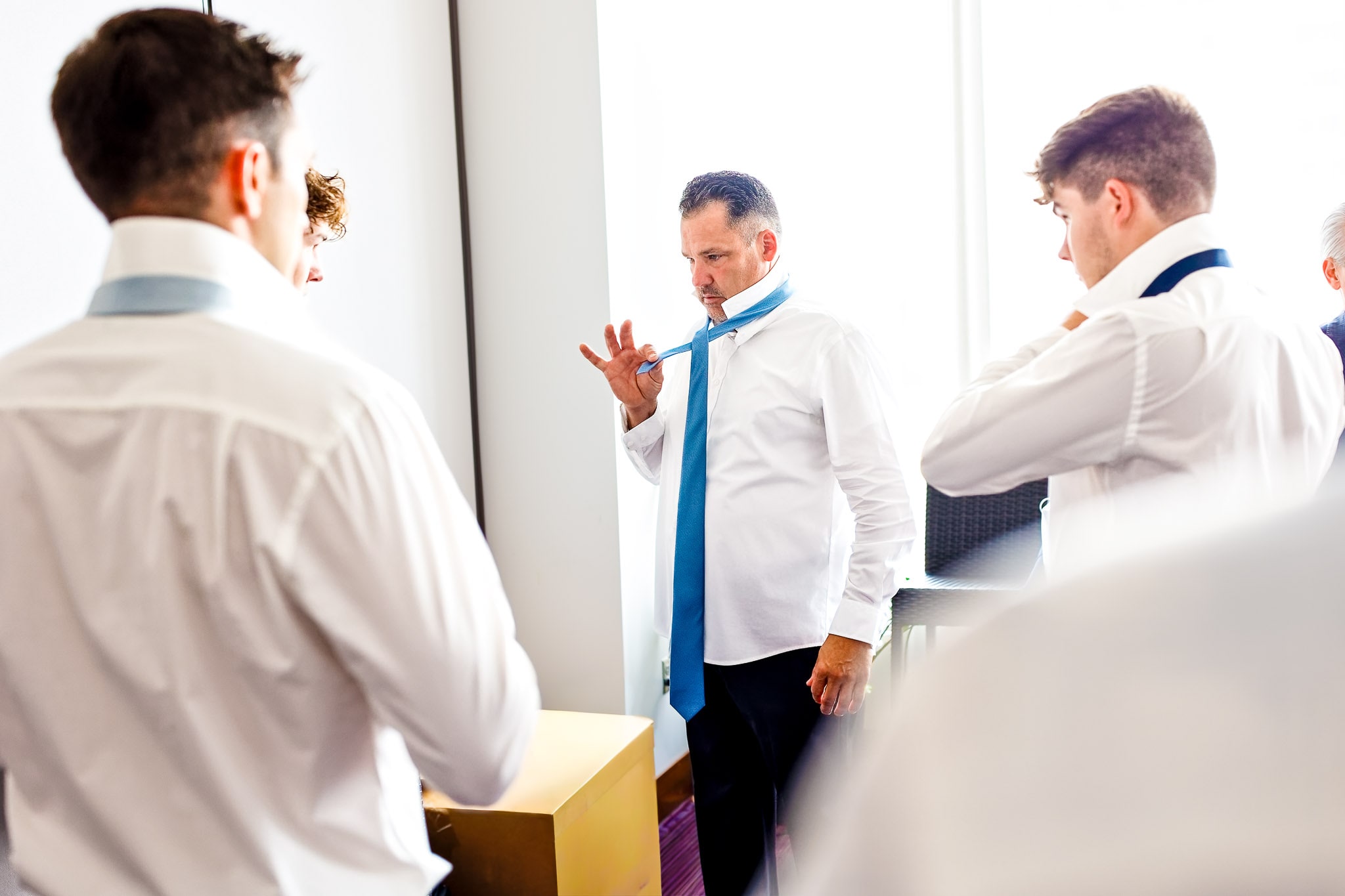 Father Teaching Groomsmen Tie Preparation Rochester Wedding