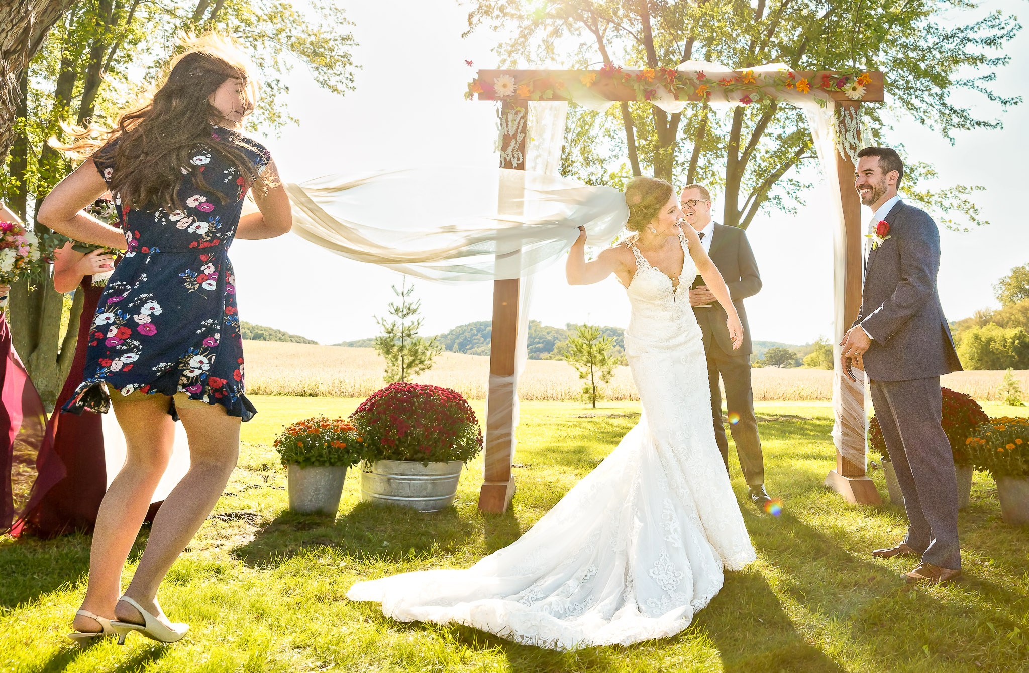 Wind-Blown Veil Moment at Red Wing Minnesota Wedding Ceremony