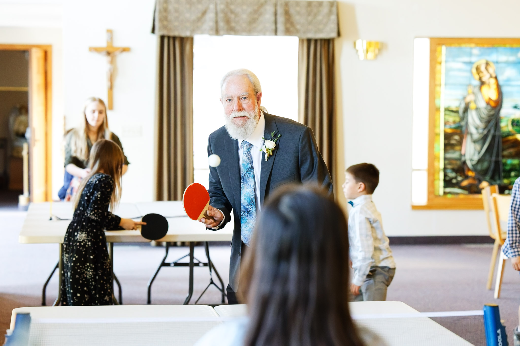 Father of Groom Playing Table Tennis at Wedding Reception