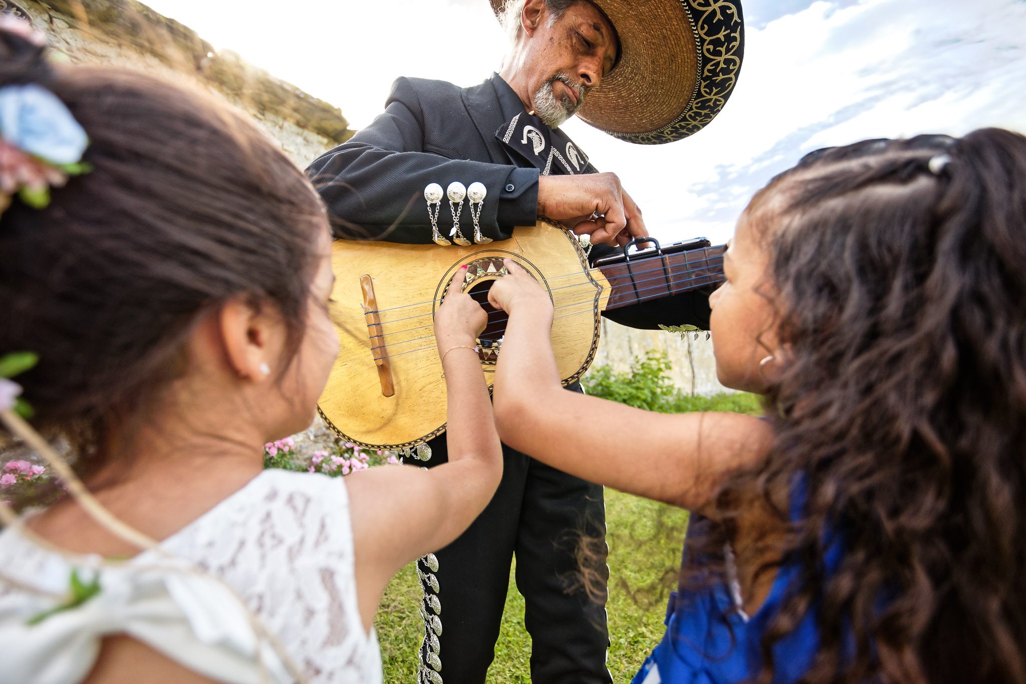 Children Meet Mariachi Musician During Wedding Cocktail Hour