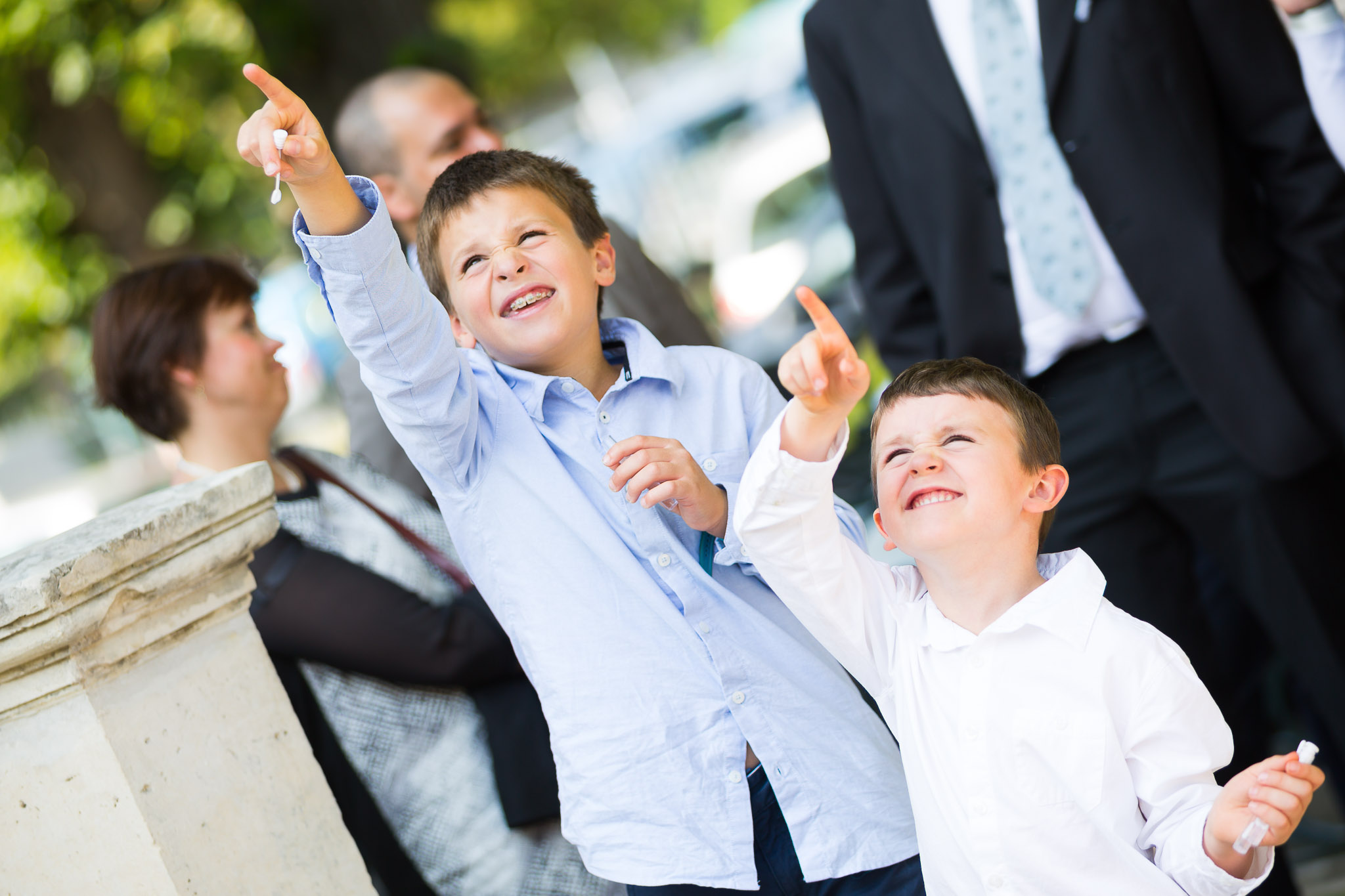 Kids Pointing at Sky During Wedding Cocktail Hour