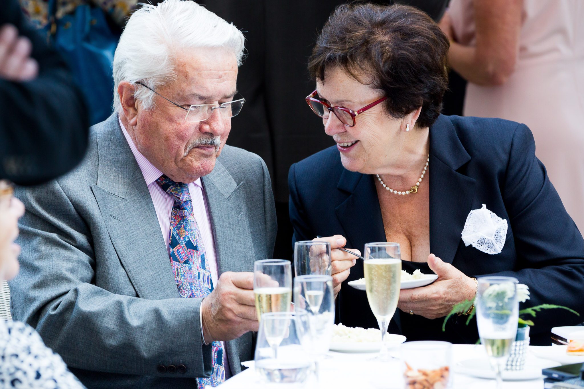 Wedding Guests Laughing During Cocktail Hour Reception