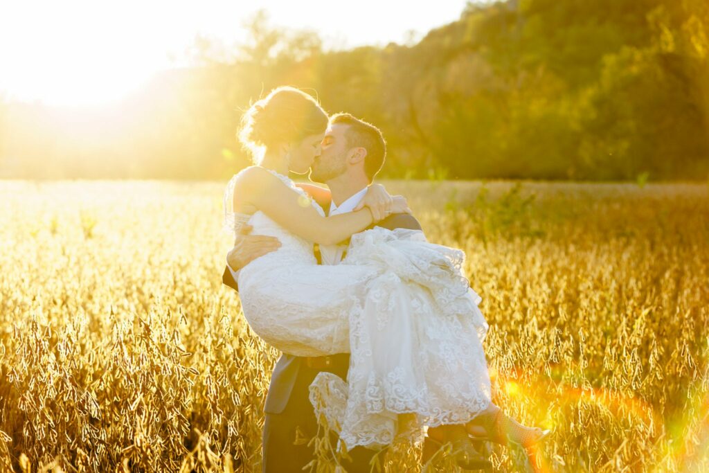 Romantic Sunset Wedding Photos in Golden Field