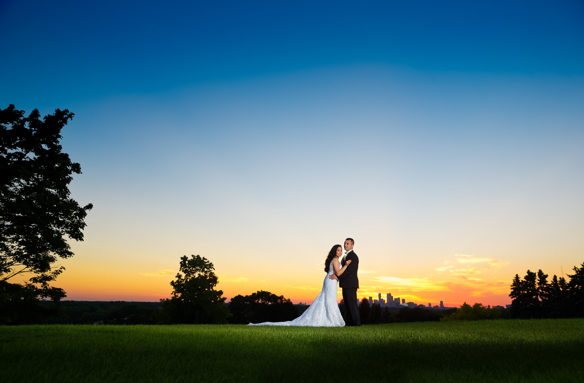 Sunset Wedding Portrait with City Skyline - Romantic Couple Phot