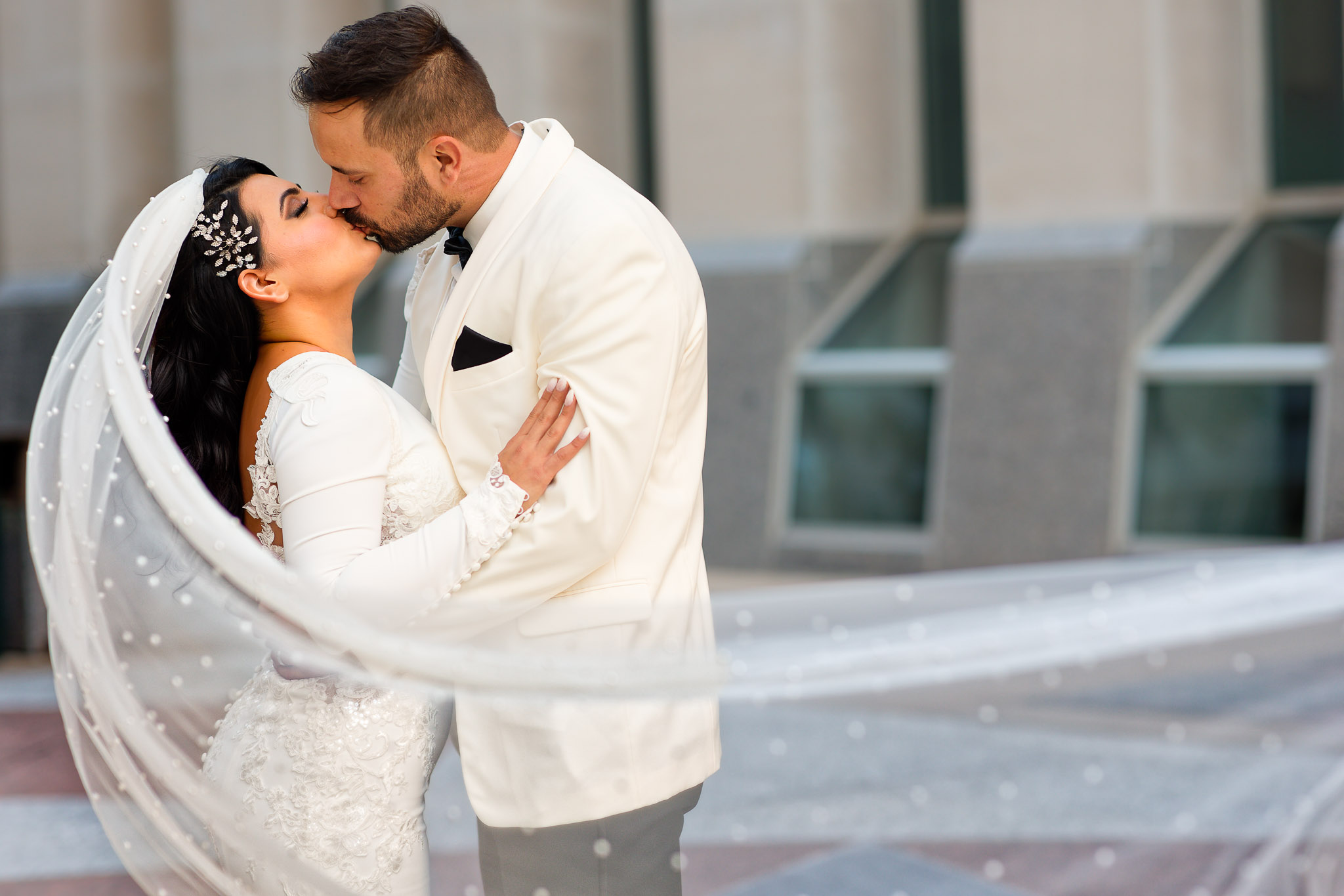 Romantic Wedding Kiss with Flowing Veil - Minneapolis Photograph