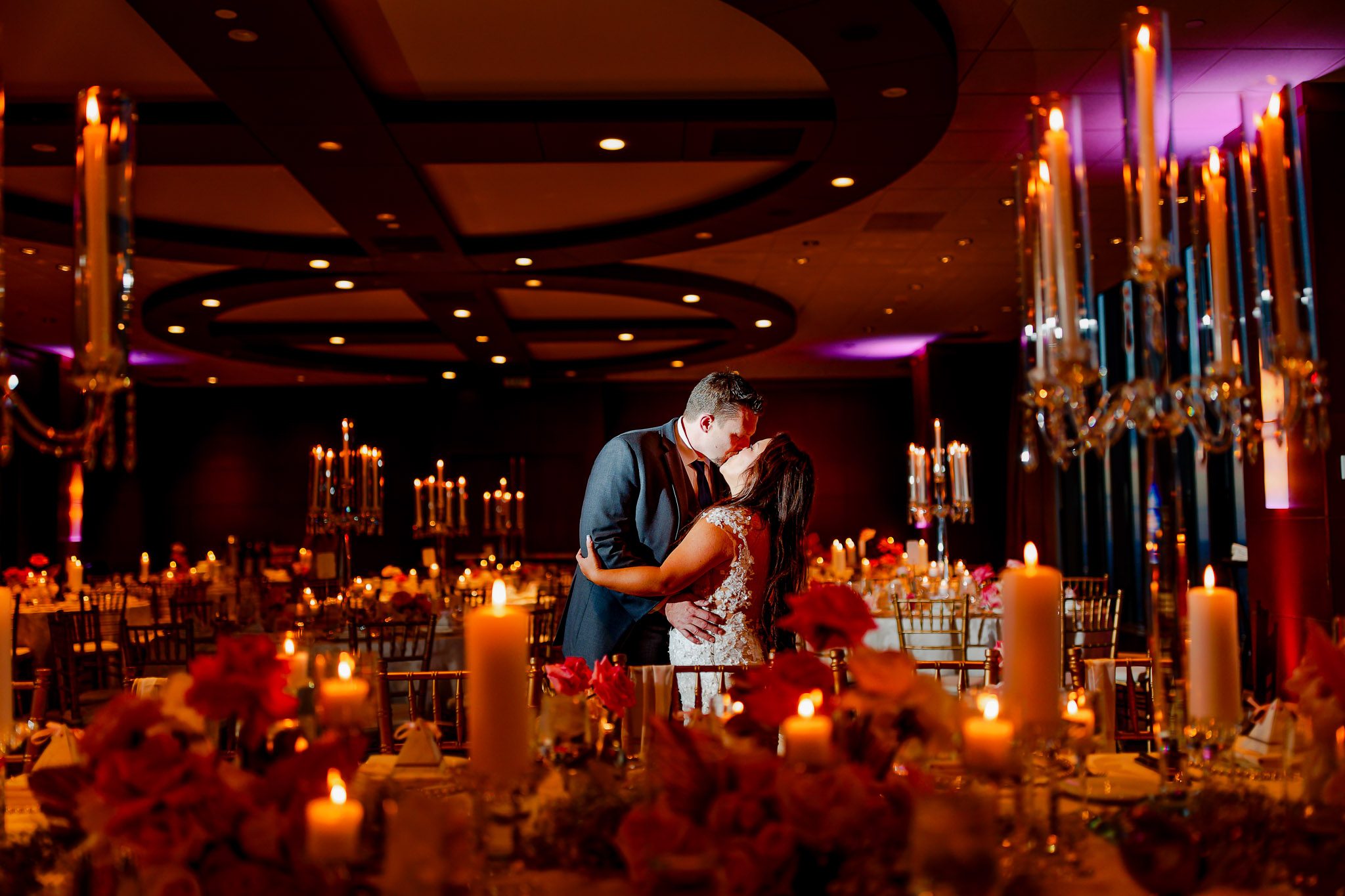 Romantic Kiss in Candlelit Minneapolis Wedding Ballroom