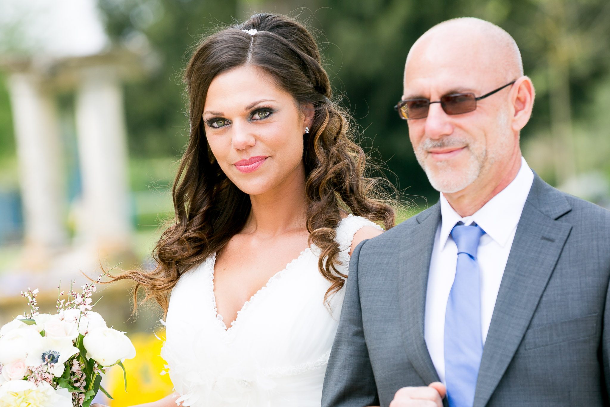 Bride's Father Escorts Her During Courthouse Wedding Entrance