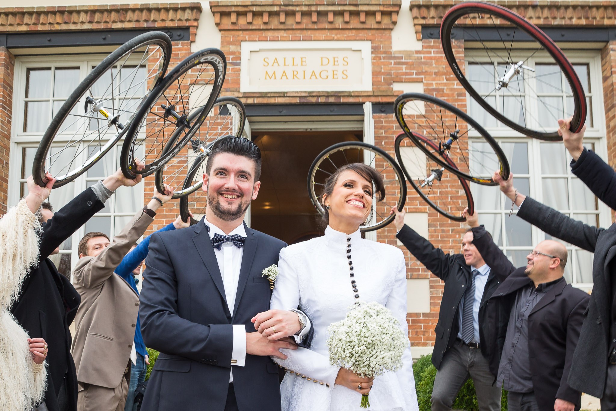 Cyclist Friends Create Bicycle Wheel Arch for Wedding Grand Exit