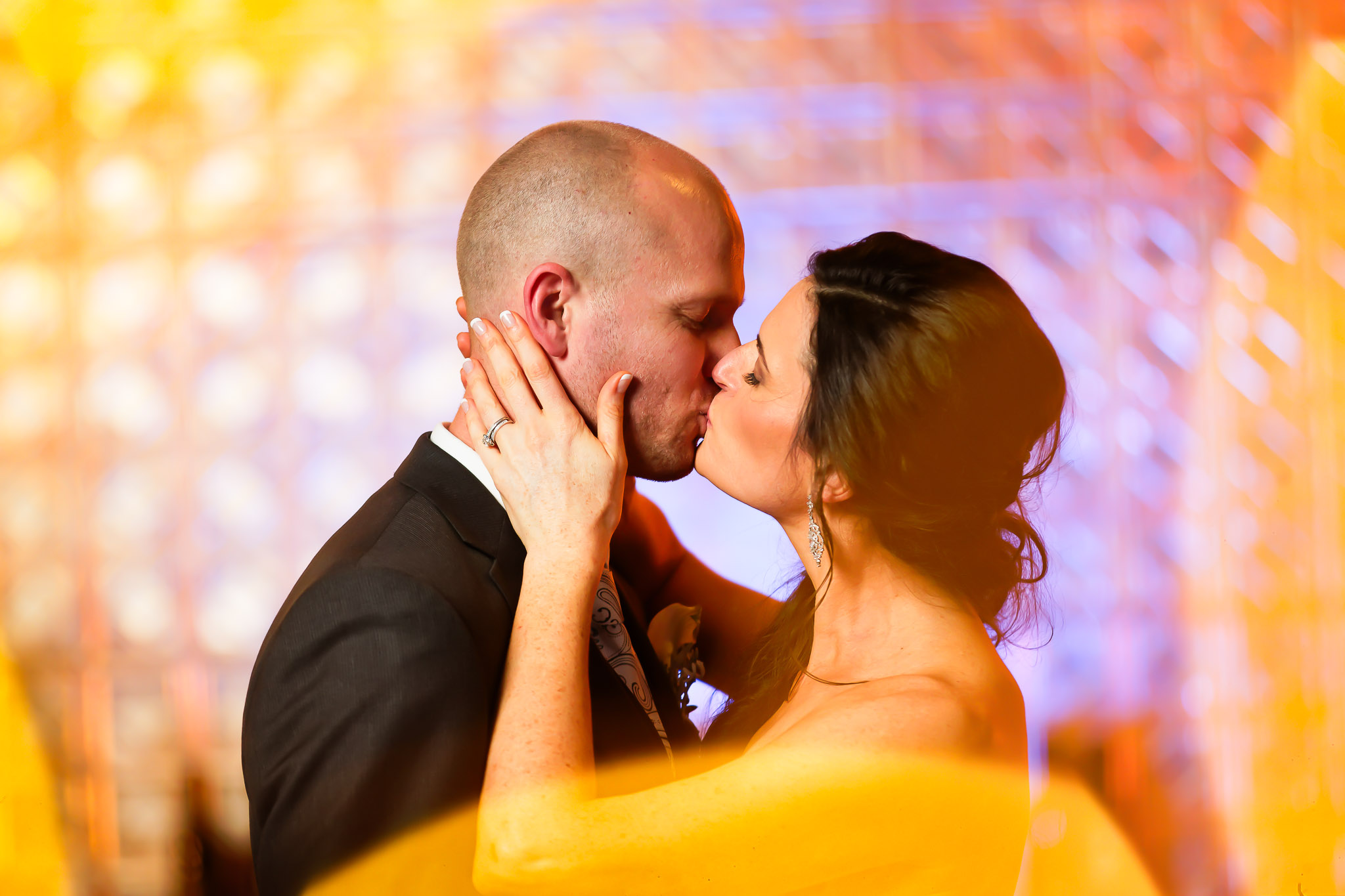 Purple Fairy Light Wedding Kiss at Saint James Hotel Redwing