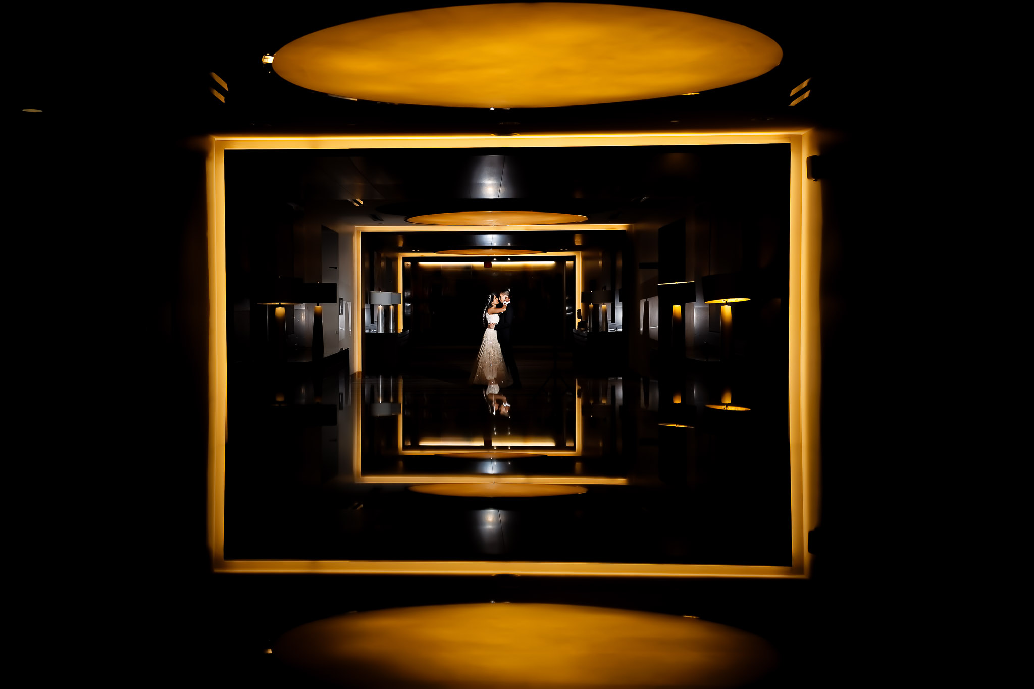 Creative Hotel Hallway Wedding Portrait with Mirror Frames