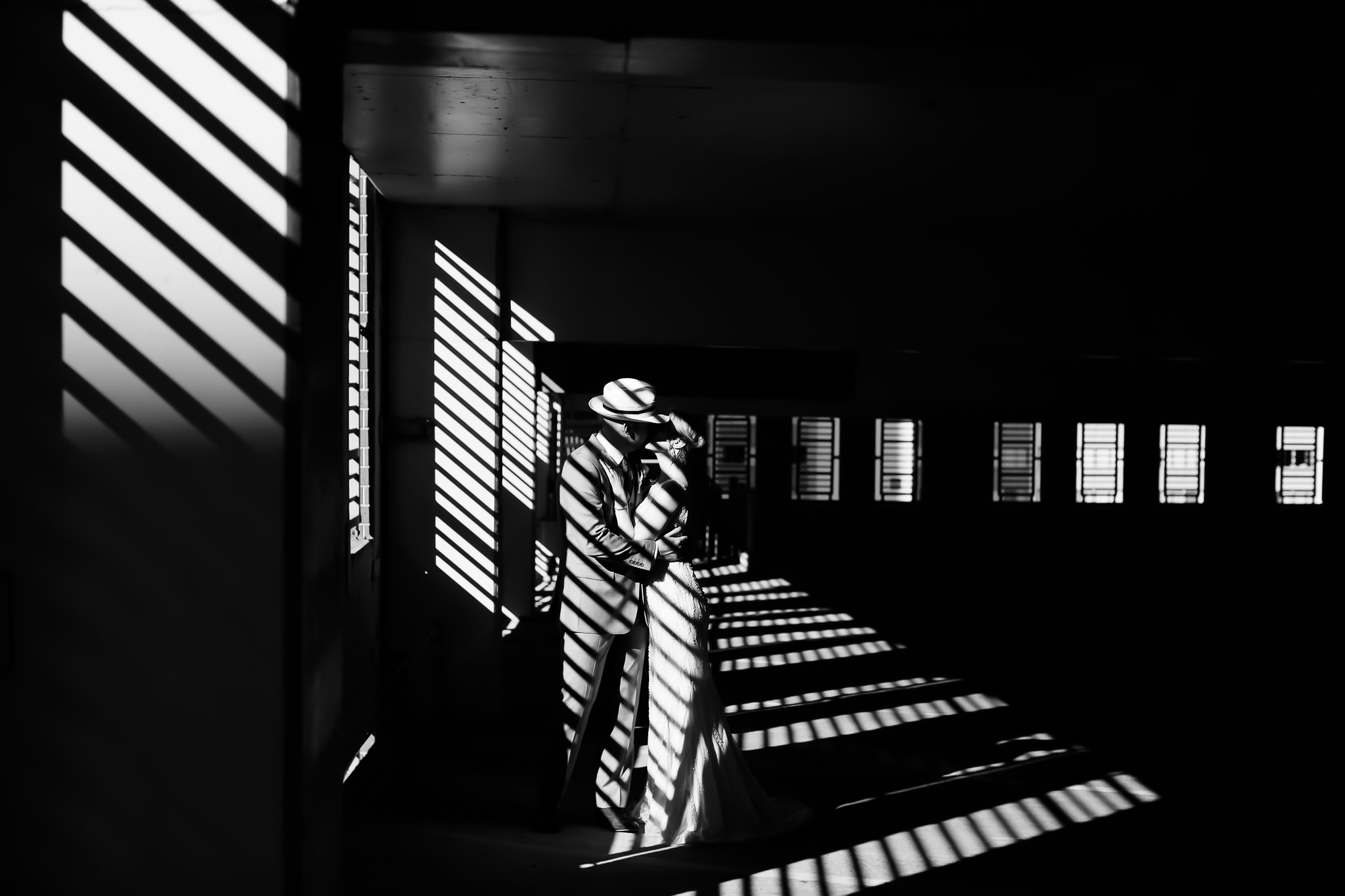 Creative Parking Garage Wedding Portrait with Dramatic Shadows