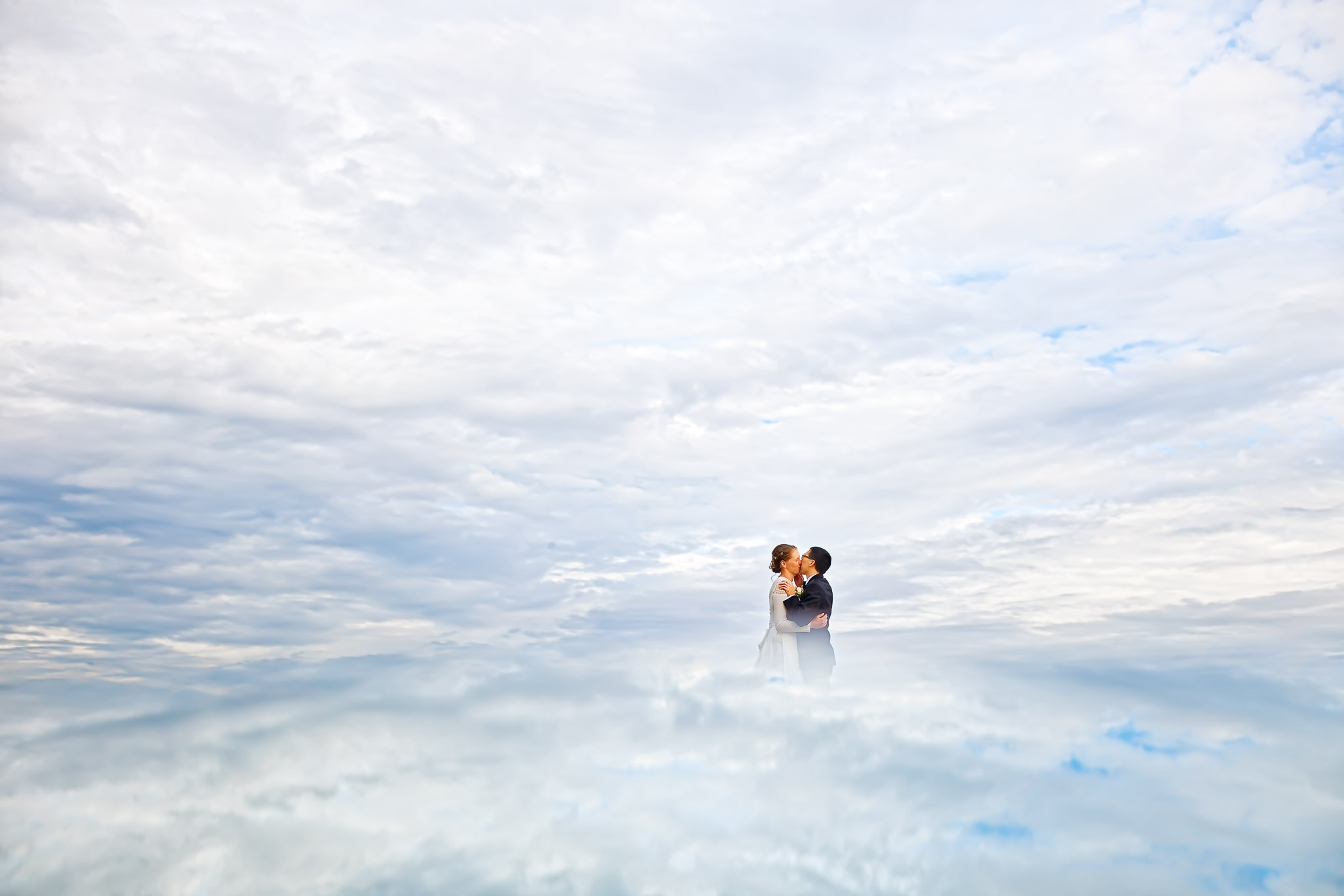 Creative Mirror Wedding Portrait with Cloudy Sky at Pond View Ba