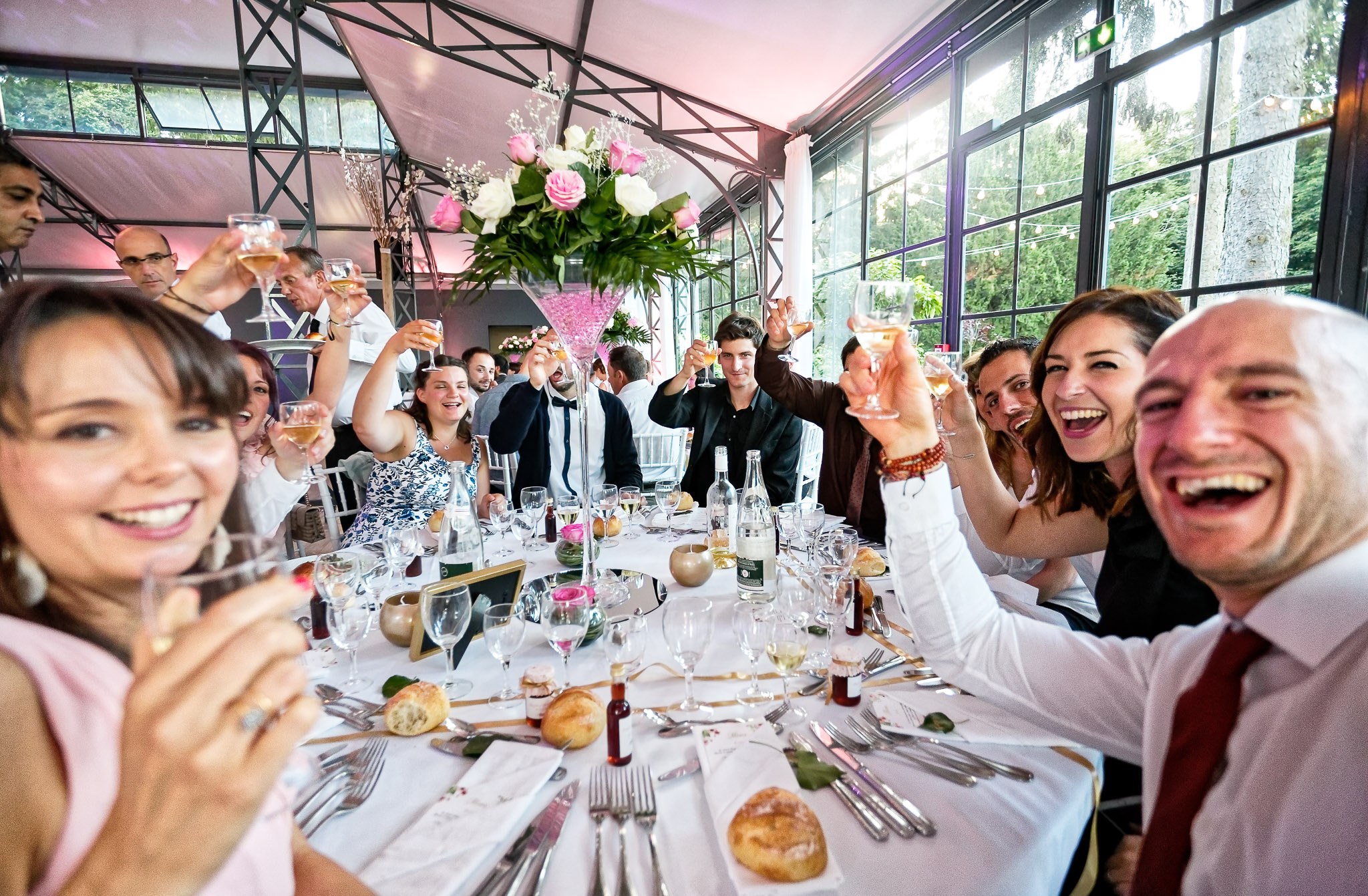 Wedding Guests Champagne Toast During Dinner Reception