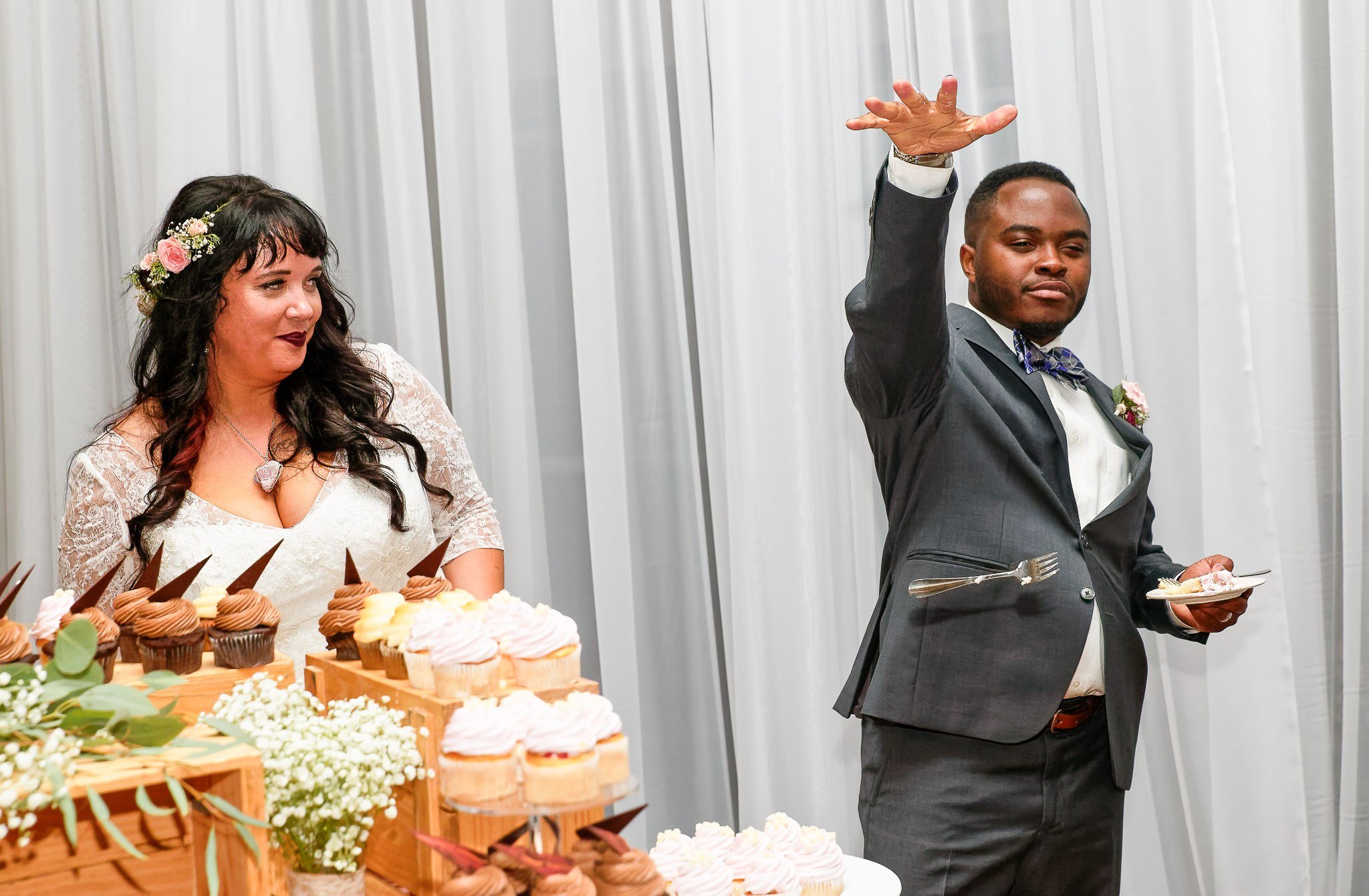 Groom Drops Fork Like Microphone During Wedding Cake Moment