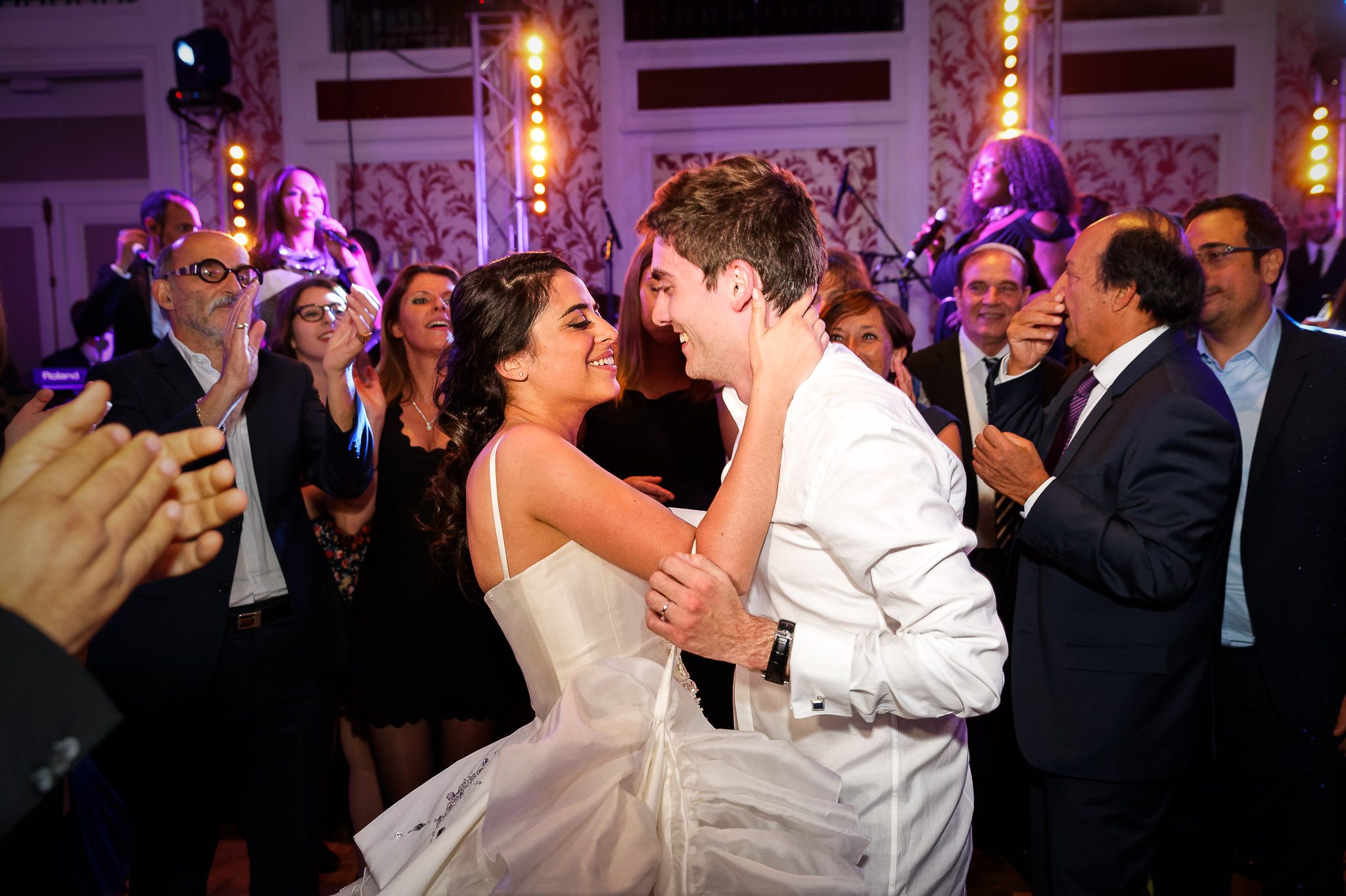 Wedding Reception Dancing with Guests Celebrating Newlyweds