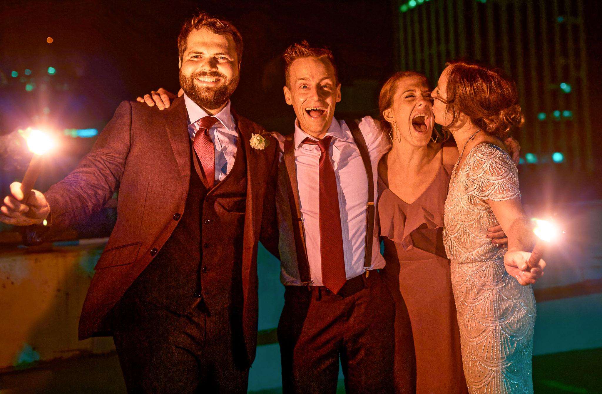 Rooftop Wedding Reception Celebration with City Lights