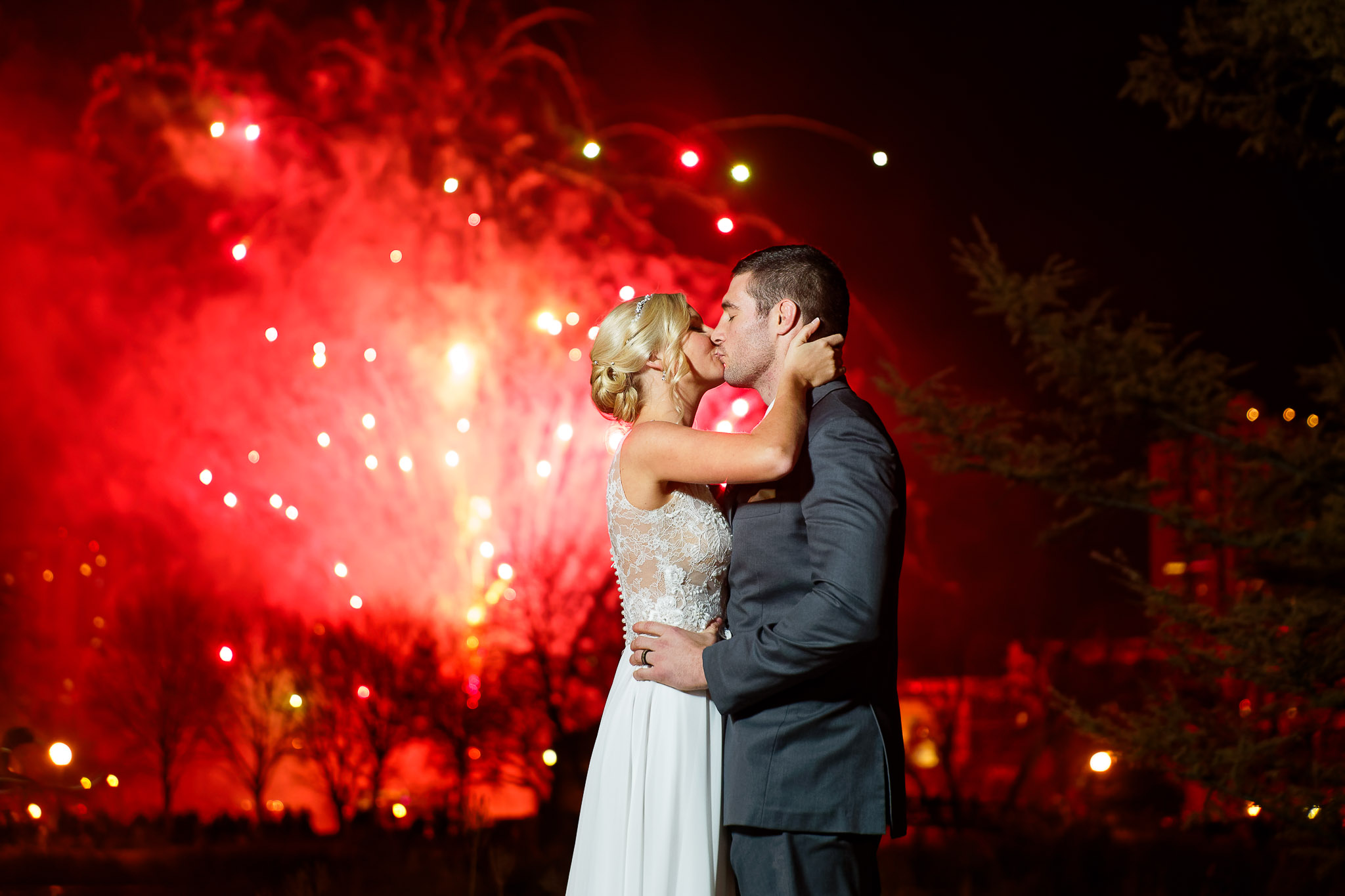 Wedding Fireworks Kiss - Romantic Reception Moment