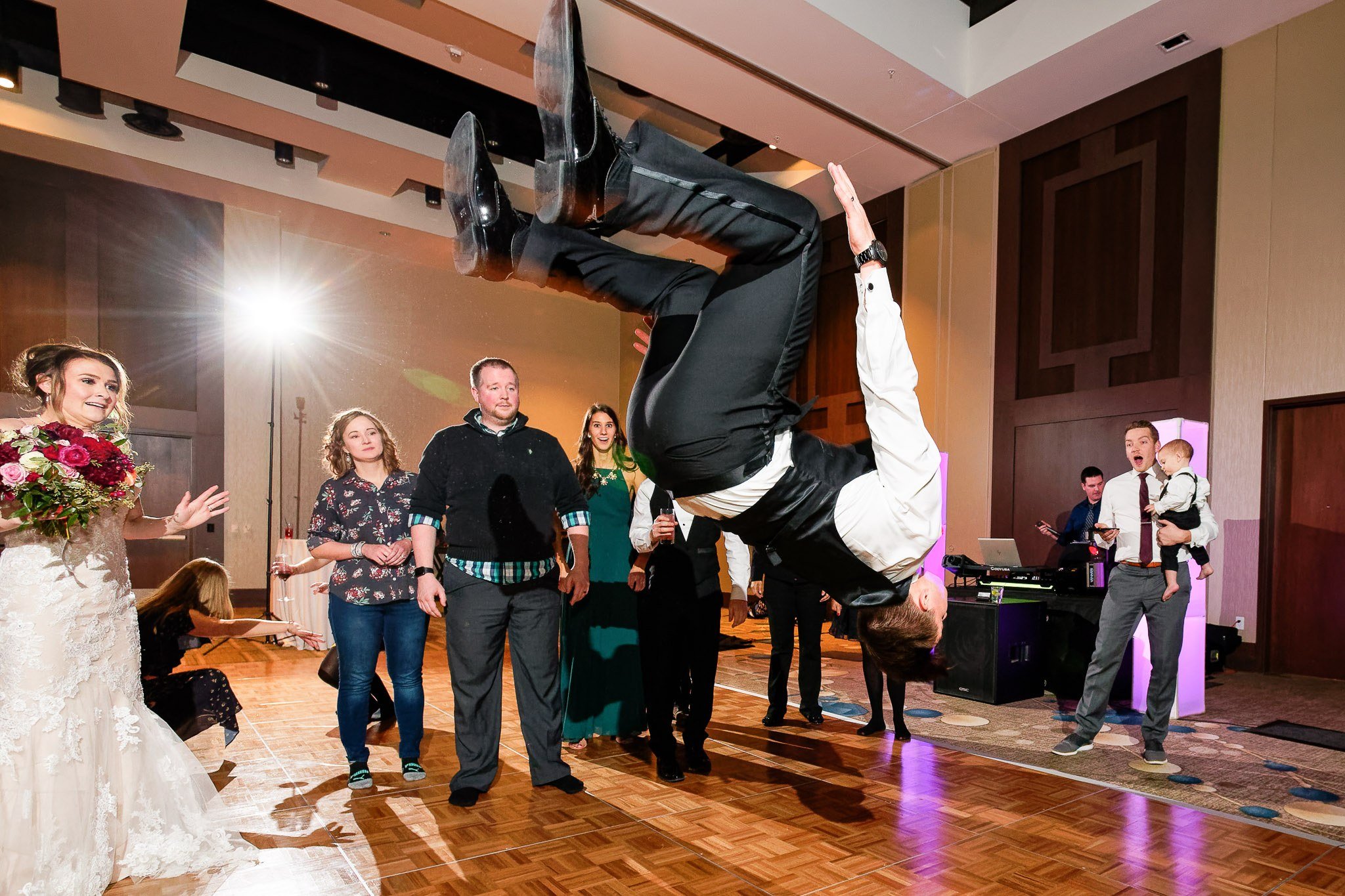 Groom Does Somersault on Wedding Reception Dance Floor