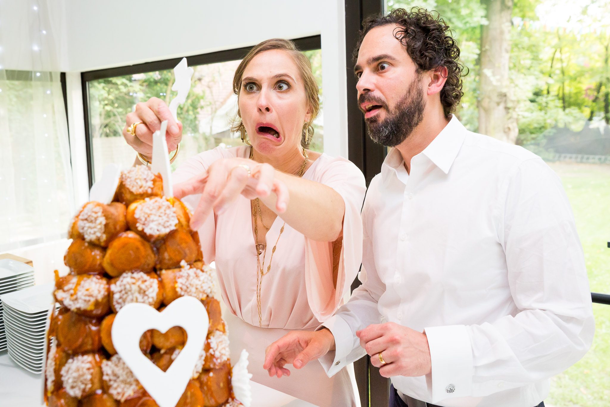 Wedding Cake Cutting Fail: Bride's Funny Reaction to Broken Topp